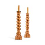 A PAIR OF SPALTED BEECH BARLEY TWIST CANDLESTICKS BY LINLEY