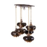 A PATINATED METAL HANGING CEILING LIGHT BY FELDMAN LIGHTING COMPANY