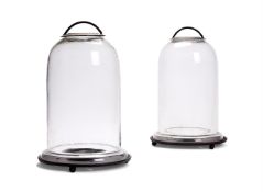 A PAIR OF GLASS AND PATINATED METAL BELL JAR STORM LANTERNS, MODERN