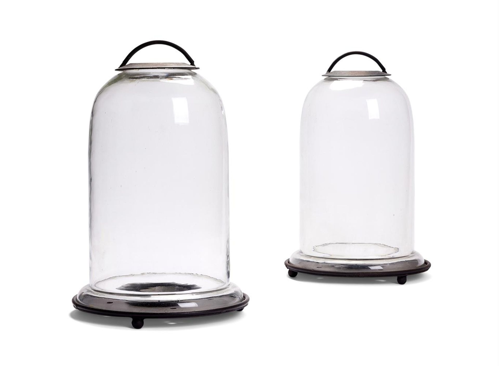 A PAIR OF GLASS AND PATINATED METAL BELL JAR STORM LANTERNS, MODERN