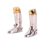 A PAIR OF SILVER AND SILVER-GILT MOUNTED HUNTING BOOT SALT AND PEPPER SHAKERS