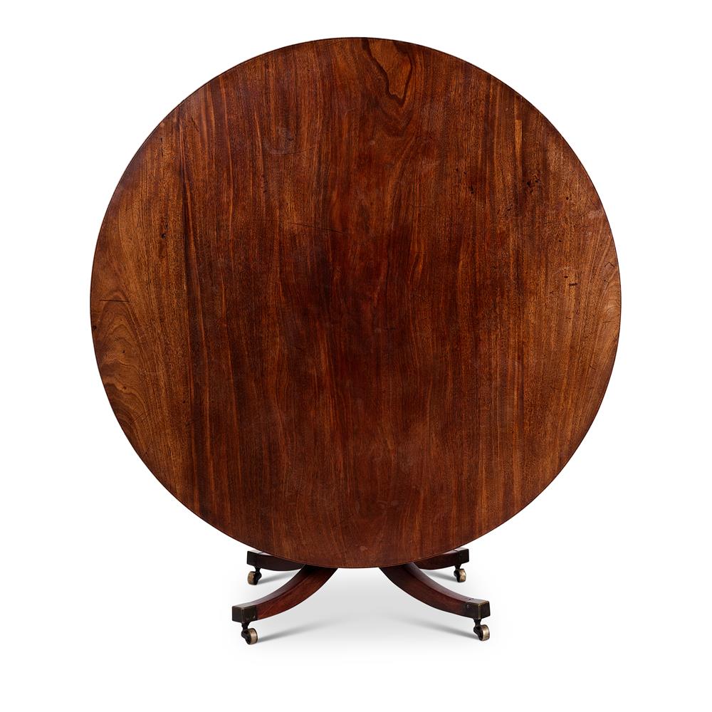 A MAHOGANY CONCENTRIC EXTENDING DINING TABLE IN THE MANNER OF JUPE - Image 2 of 2