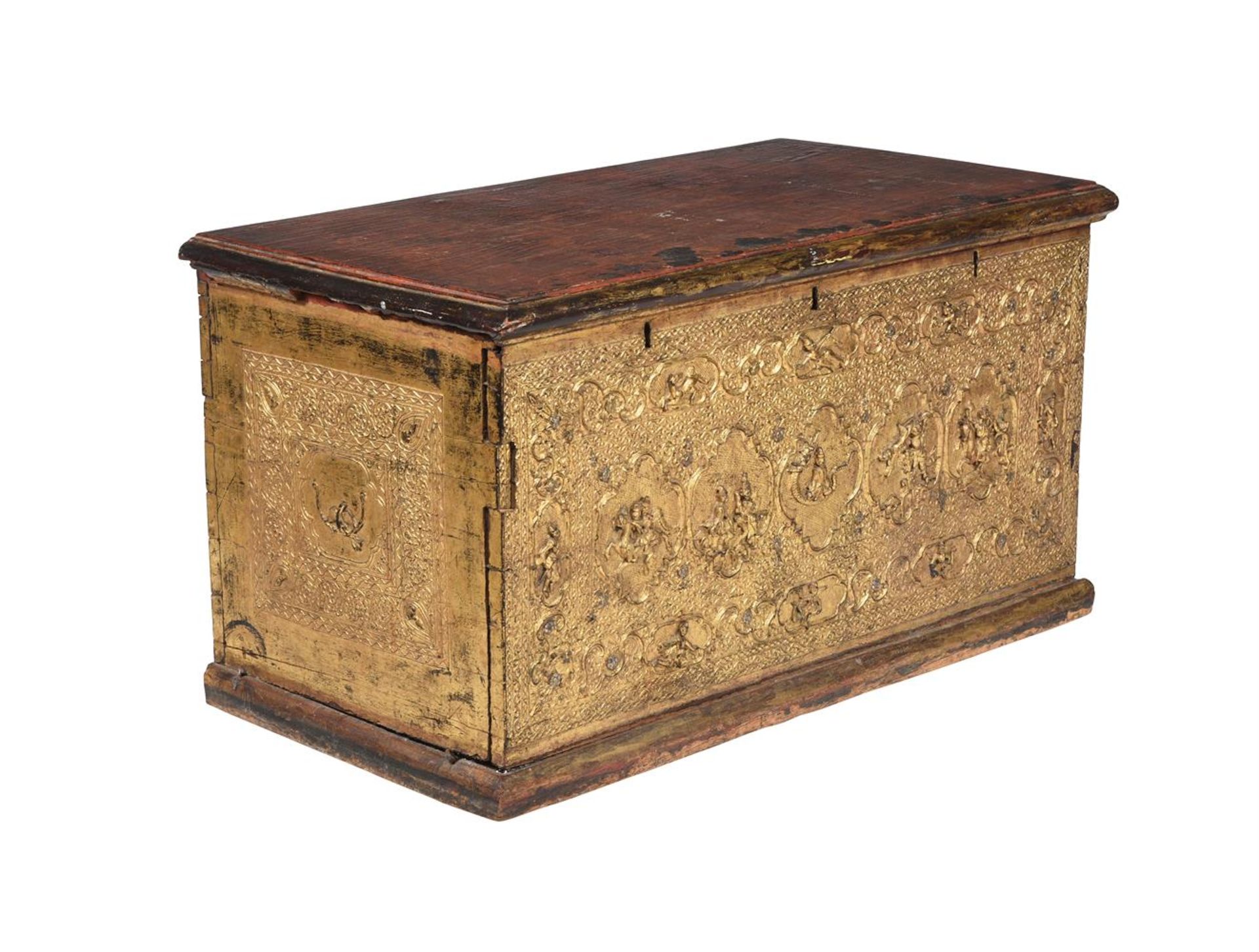 A CARVED GILTWOOD AND POLYCHROME LACQUERED CHEST, POSSIBLY TIBETAN