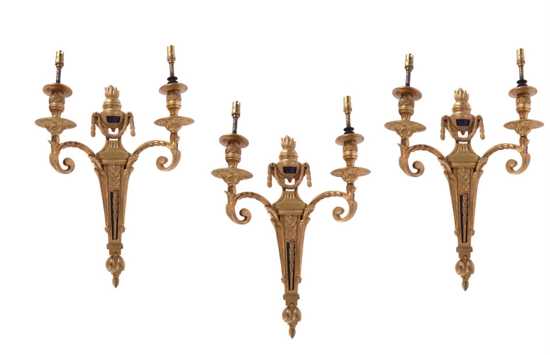 A SET OF FOUR GILT METAL AND BLUE PORCELAIN INSET TWIN WALL APPLIQUES IN LOUIS XV STYLE