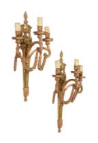 A SET OF FOUR LARGE GILT METAL