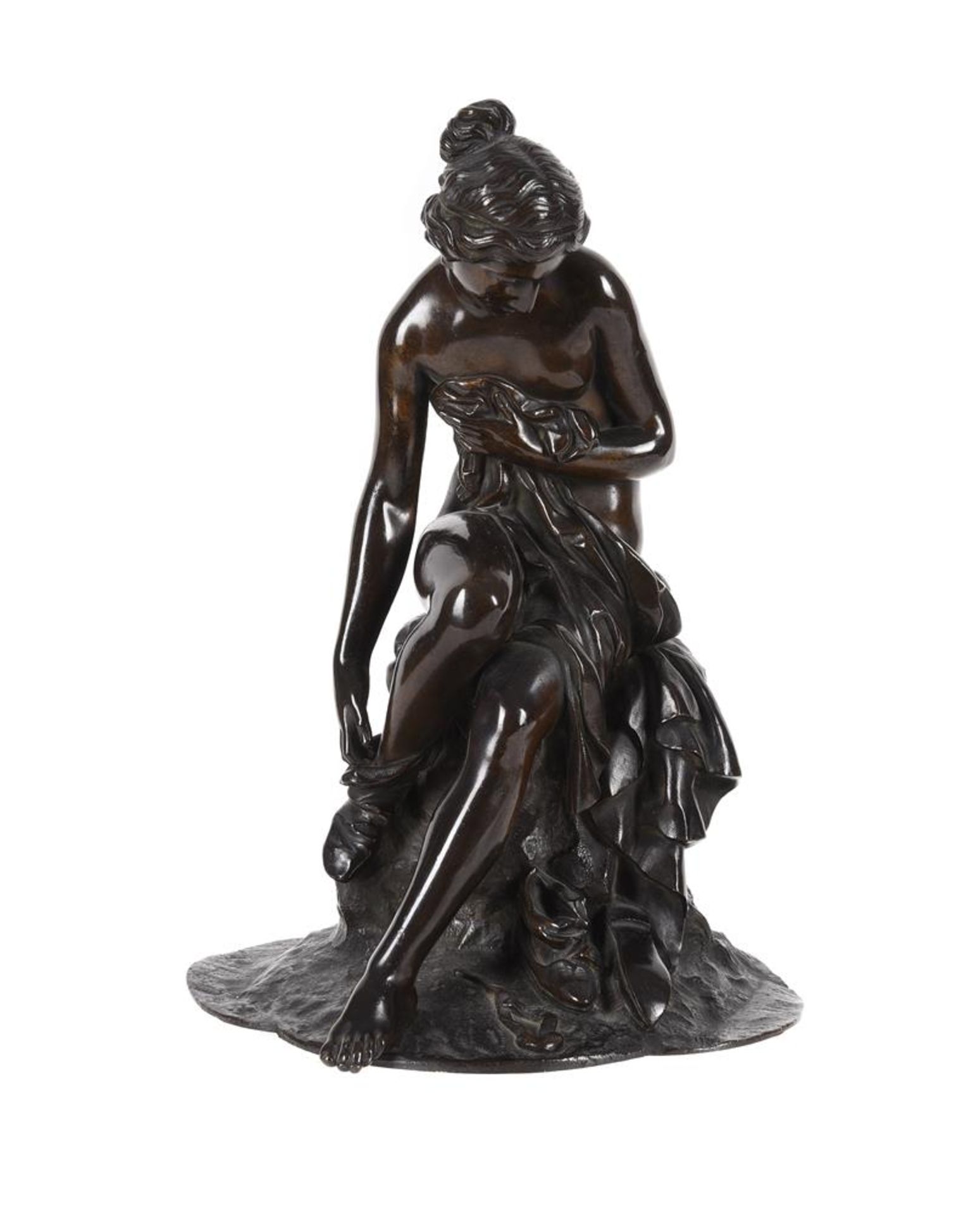 A BRONZE FIGURE OF A BATHING CLASSICAL MAIDEN