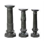A GROUP OF THREE SERPENTINE MARBLE PEDESTAL COLUMNS, LATE 19TH OR 20TH CENTURY
