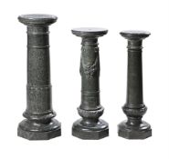 A GROUP OF THREE SERPENTINE MARBLE PEDESTAL COLUMNS, LATE 19TH OR 20TH CENTURY