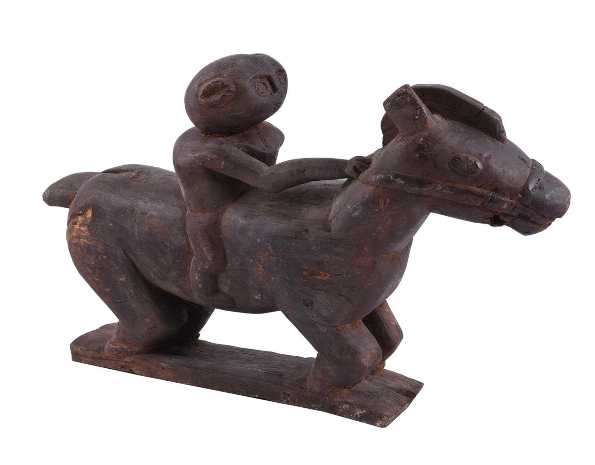 A TIMOR CARVED WOODEN FIGURE OF A HORSE AND RIDER