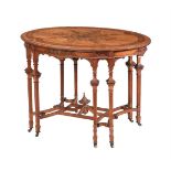 AN EDWARDIAN SATINWOOD AND MARQUETRY OVAL CENTRE TABLE, IN THE MANNER OF MAPLE & CO