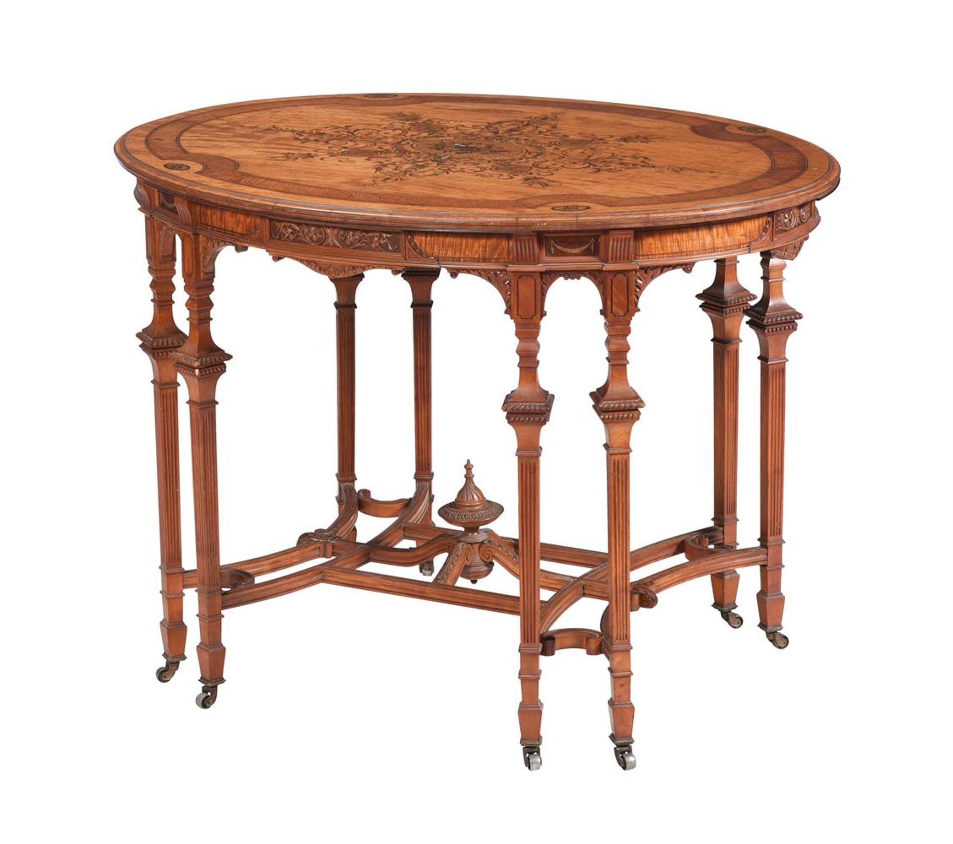 AN EDWARDIAN SATINWOOD AND MARQUETRY OVAL CENTRE TABLE, IN THE MANNER OF MAPLE & CO