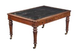 A WILLIAM IV OAK AND GILT TOOLED LEATHER INSET WRITING TABLE BY HOLLAND & SONS
