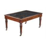 A WILLIAM IV OAK AND GILT TOOLED LEATHER INSET WRITING TABLE BY HOLLAND & SONS