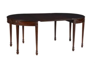 A MAHOGANY D END DINING TABLE IN GEORGE III ADAM STYLE