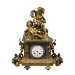 A FRENCH GILT METAL FIGURAL MANTEL CLOCK, LATE 19TH CENTURY