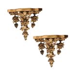 A PAIR OF VICTORIAN GILTWOOD AND COMPOSITION WALL BRACKETS