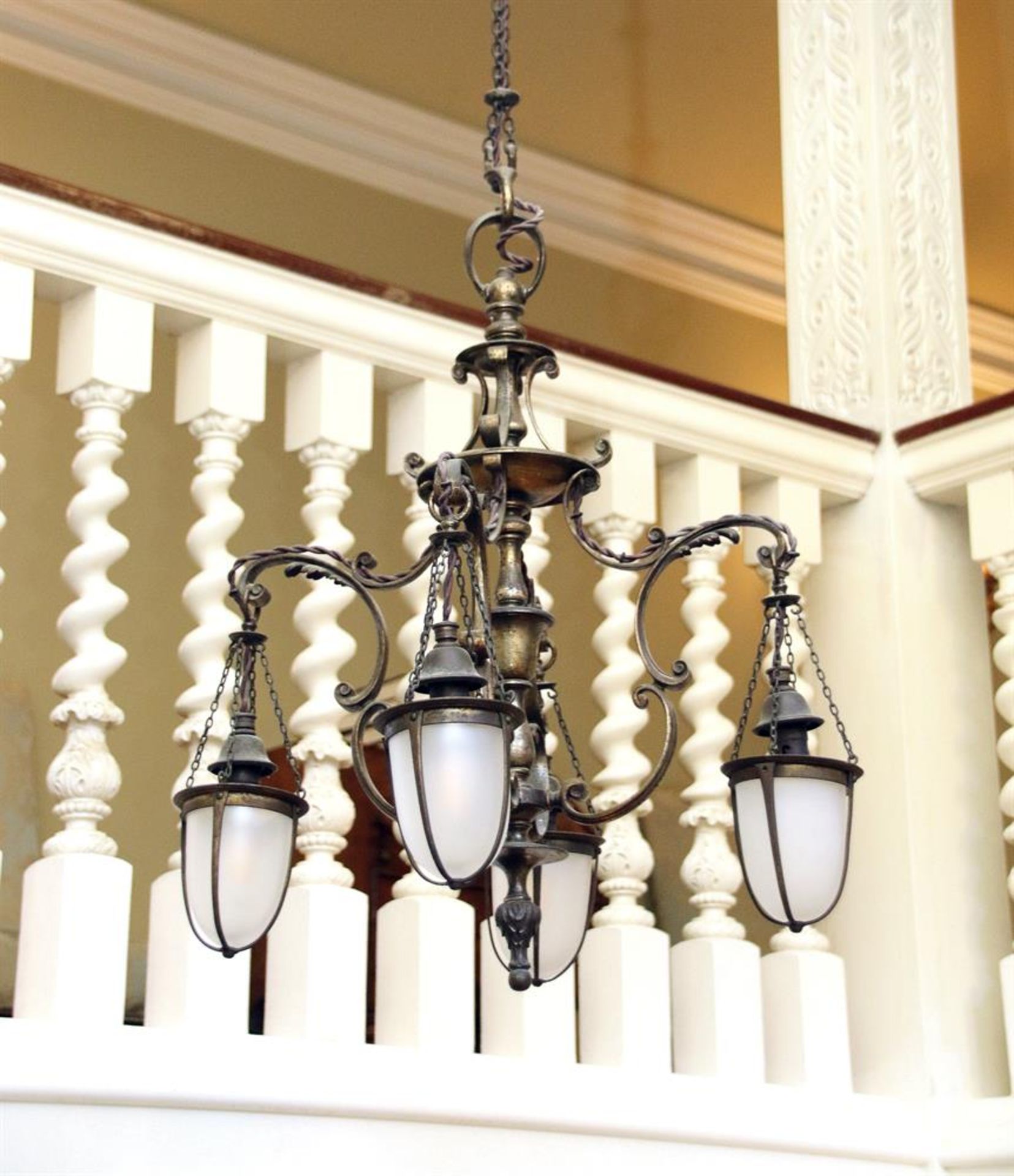 AN ARTS AND CRAFTS BRASS CHANDELIER