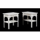 A PAIR OF CARVED AND PAINTED BEDSIDE TABLES OR ETAGERES IN GEORGE III STYLE