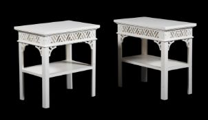 A PAIR OF CARVED AND PAINTED BEDSIDE TABLES OR ETAGERES IN GEORGE III STYLE