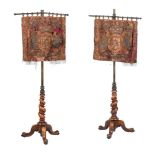 A PAIR OF WILLIAM IV WALNUT POLE SCREENS, CIRCA 1835