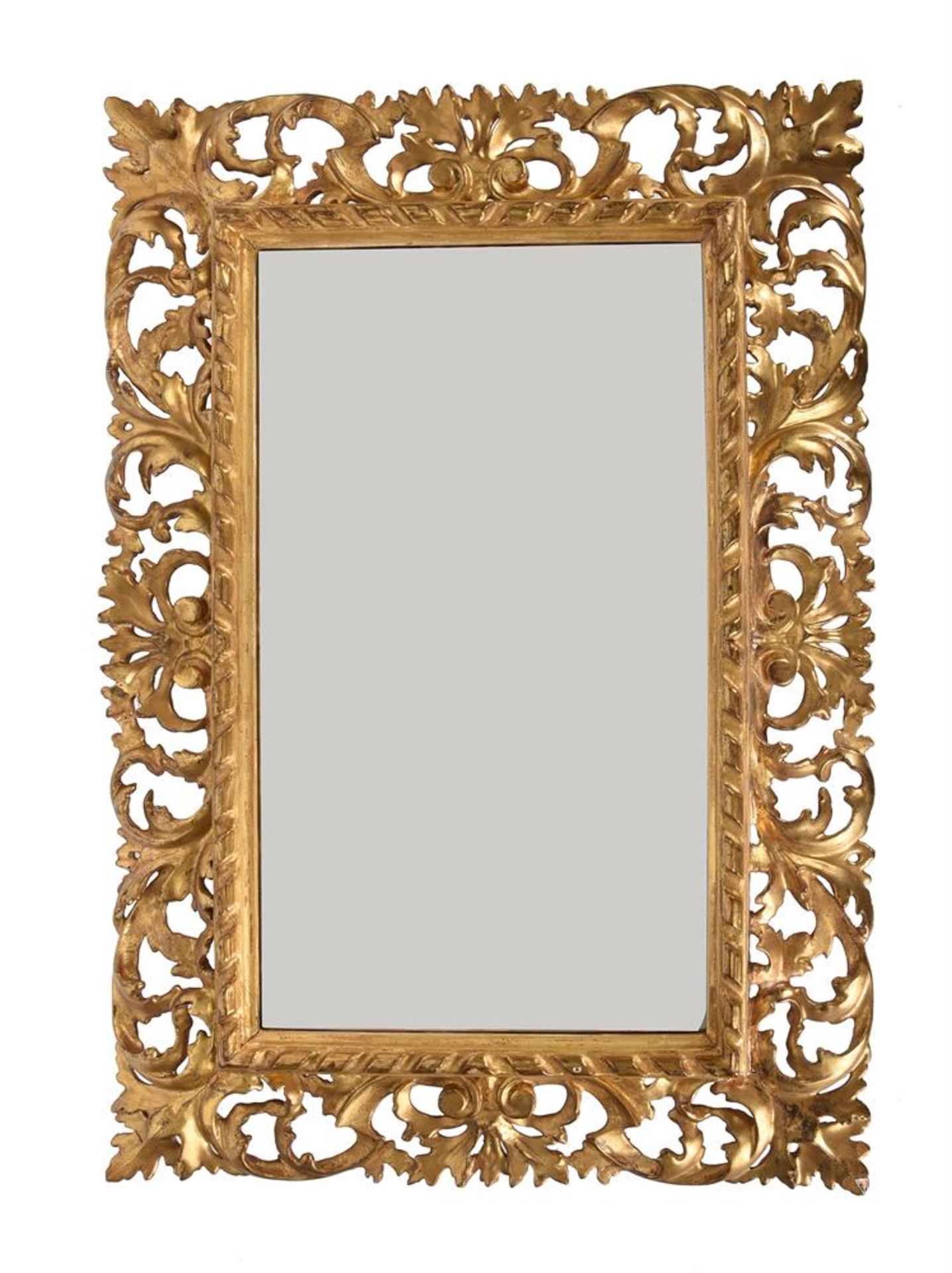 A FLORENTINE GILTWOOD WALL MIRROR