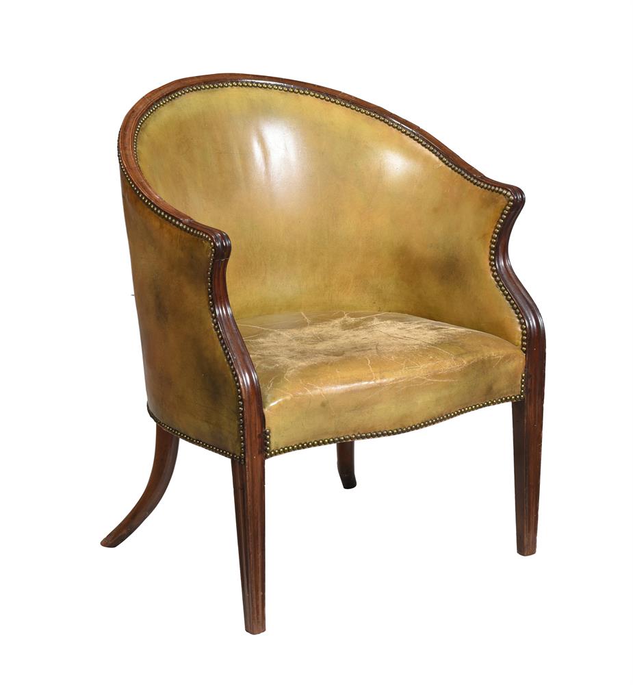 A MAHOGANY AND LEATHER UPHOLSTERED LIBRARY ARMCHAIR, EARLY 19TH CENTURY
