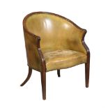 A MAHOGANY AND LEATHER UPHOLSTERED LIBRARY ARMCHAIR, EARLY 19TH CENTURY