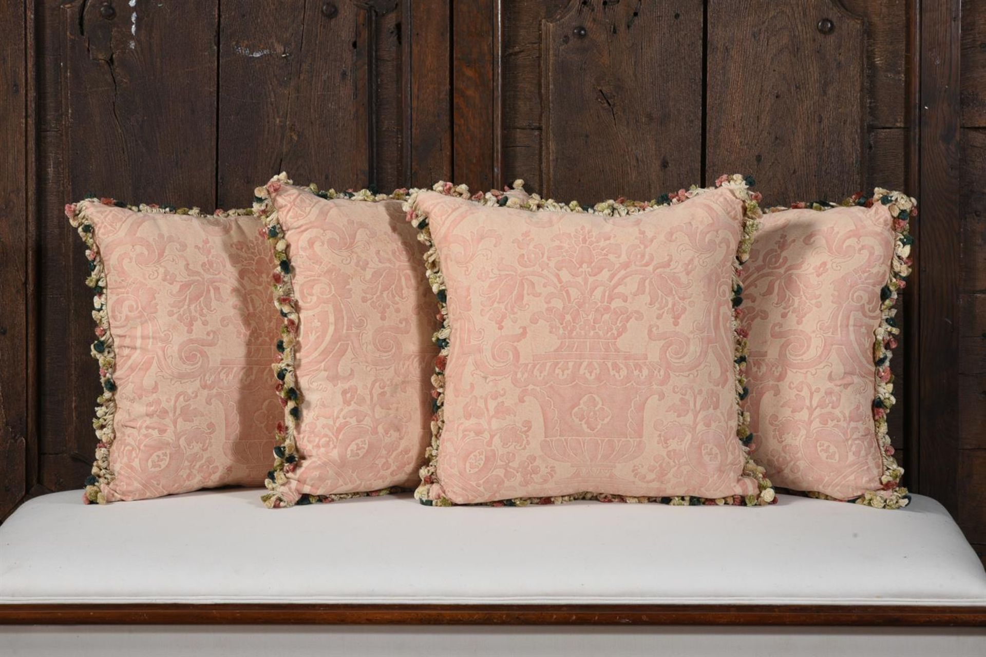 A SET OF FOUR CUSHIONS