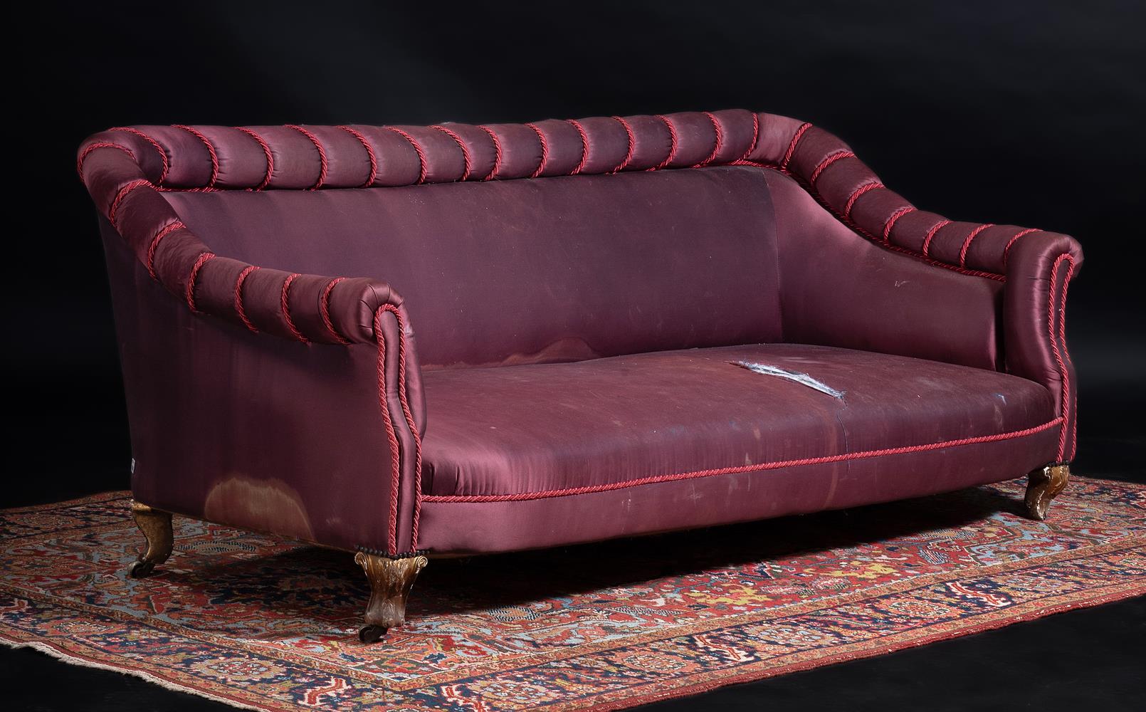 AN EARLY VICTORIAN GILTWOOD AND UPHOLSTERED SOFA