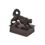 A BRONZE MODEL OF A SPANIEL