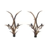A PAIR OF DEER ANTLER AND COPPER WALL APPLIQUES
