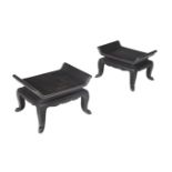 A PAIR OF FRENCH BLACK LACQUERED LOW OCCASIONAL TABLES IN JAPONISME TASTE