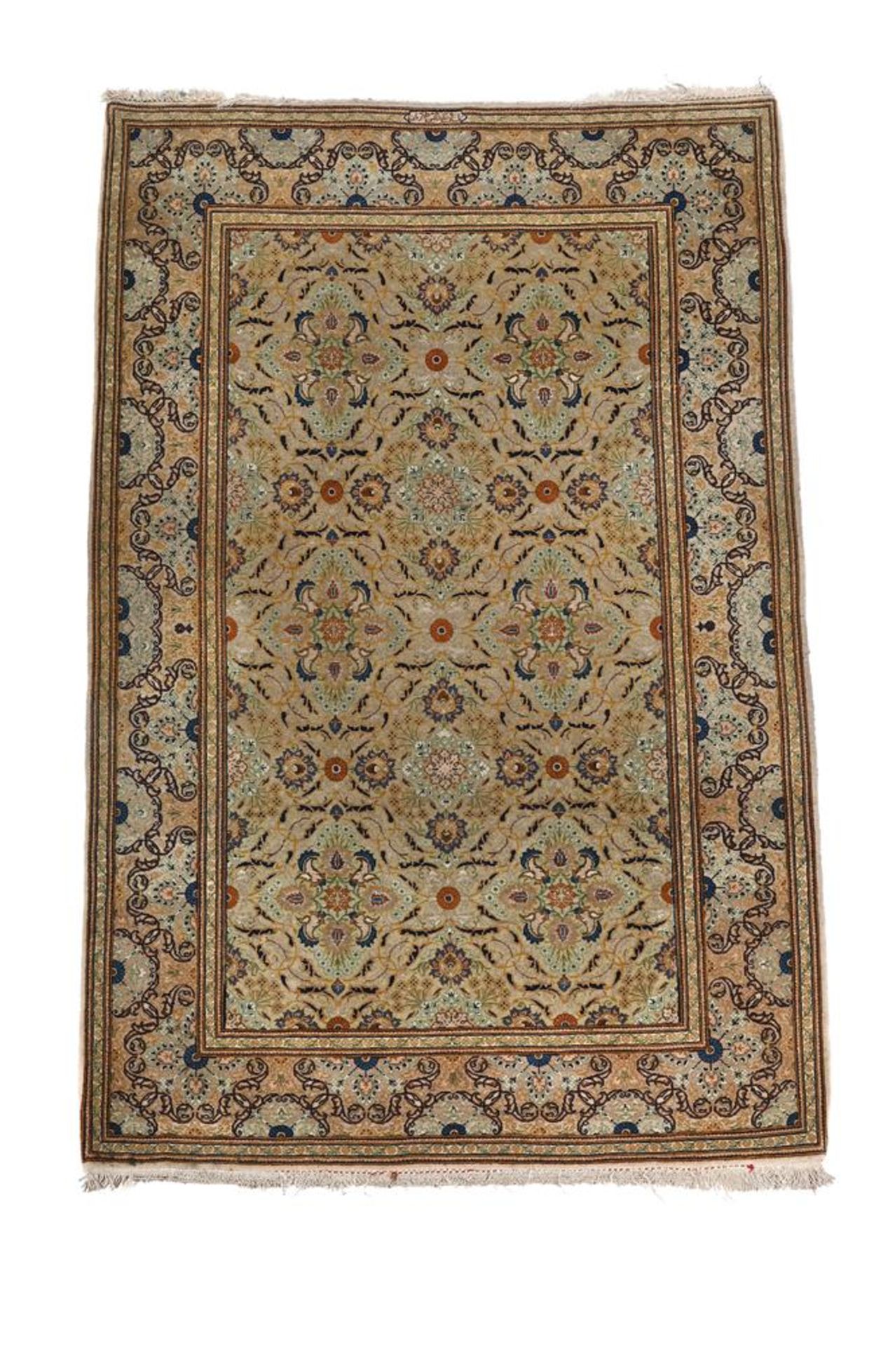 A KASHAN SILK RUG