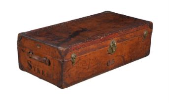 A FRENCH LEATHER AND BRASS STUDDED TRAVEL TRUNK, BY AU DEPART OF PARIS, CIRCA 1900