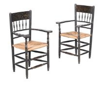 A PAIR OF AMERICAN EBONISED AND PARCEL GILT ARMCHAIRS, CIRCA 1880