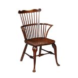 A GEORGE III ASH ELM AND FRUITWOOD WINDSOR ARMCHAIR