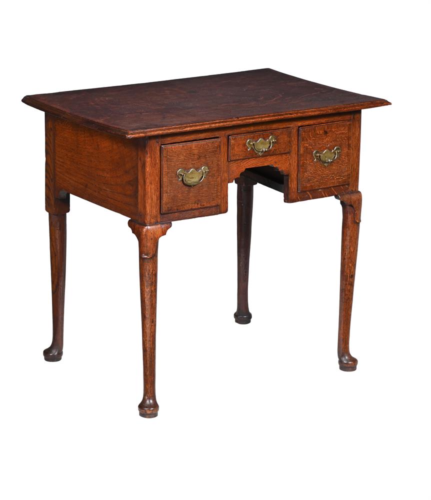 A GEORGE II OAK AND MAHOGANY CROSSBANDED SIDE TABLE, CIRCA 1750