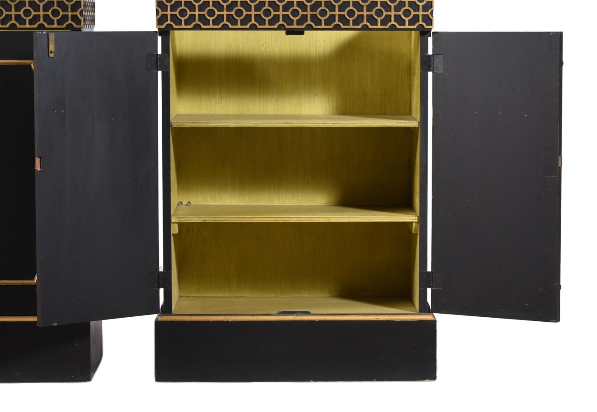 A PAIR OF EBONISED AND PARCEL GILT 'PYRAMID' OPEN BOOKCASES - Image 4 of 7