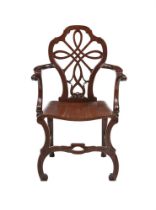 A GEORGE II CARVED MAHOGANY ARMCHAIR, CIRCA 1750