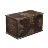 A HARDWOOD AND GILT METAL MOUNTED TRUNK OF ZANZIBAR TYPE