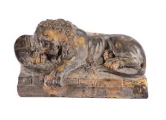 AFTER BERTEL THORVALDSEN, A PATINATED PLASTER MODEL OF THE LION OF LUCERNE