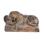 AFTER BERTEL THORVALDSEN, A PATINATED PLASTER MODEL OF THE LION OF LUCERNE