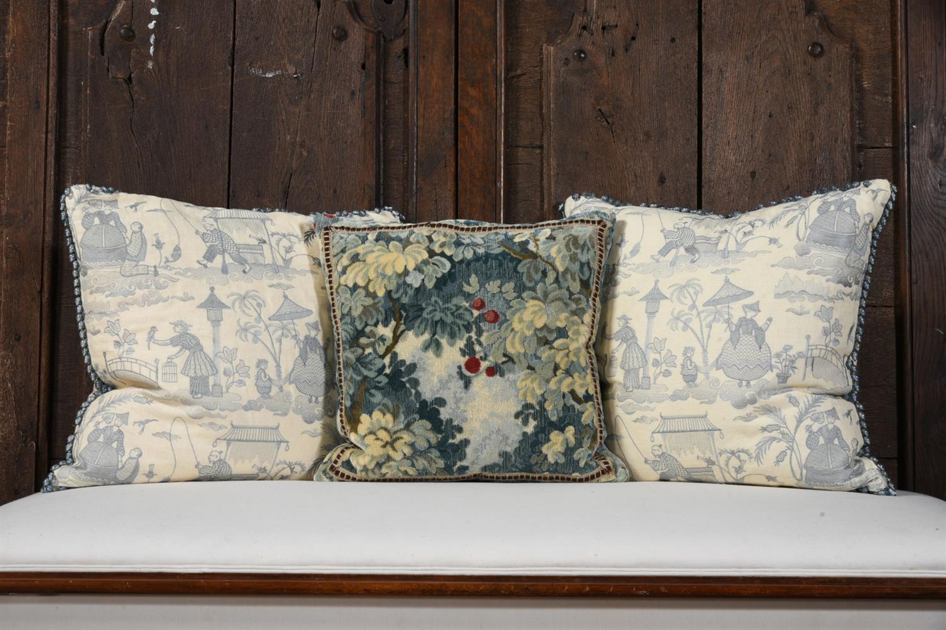 A PAIR OF CUSHIONS WITH CHINOISERIE DECORATION