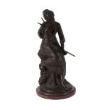 A CONTINENTAL BRONZE FIGURE OF A FEMALE FARMHAND NAPPING, LATE 19TH CENTURY