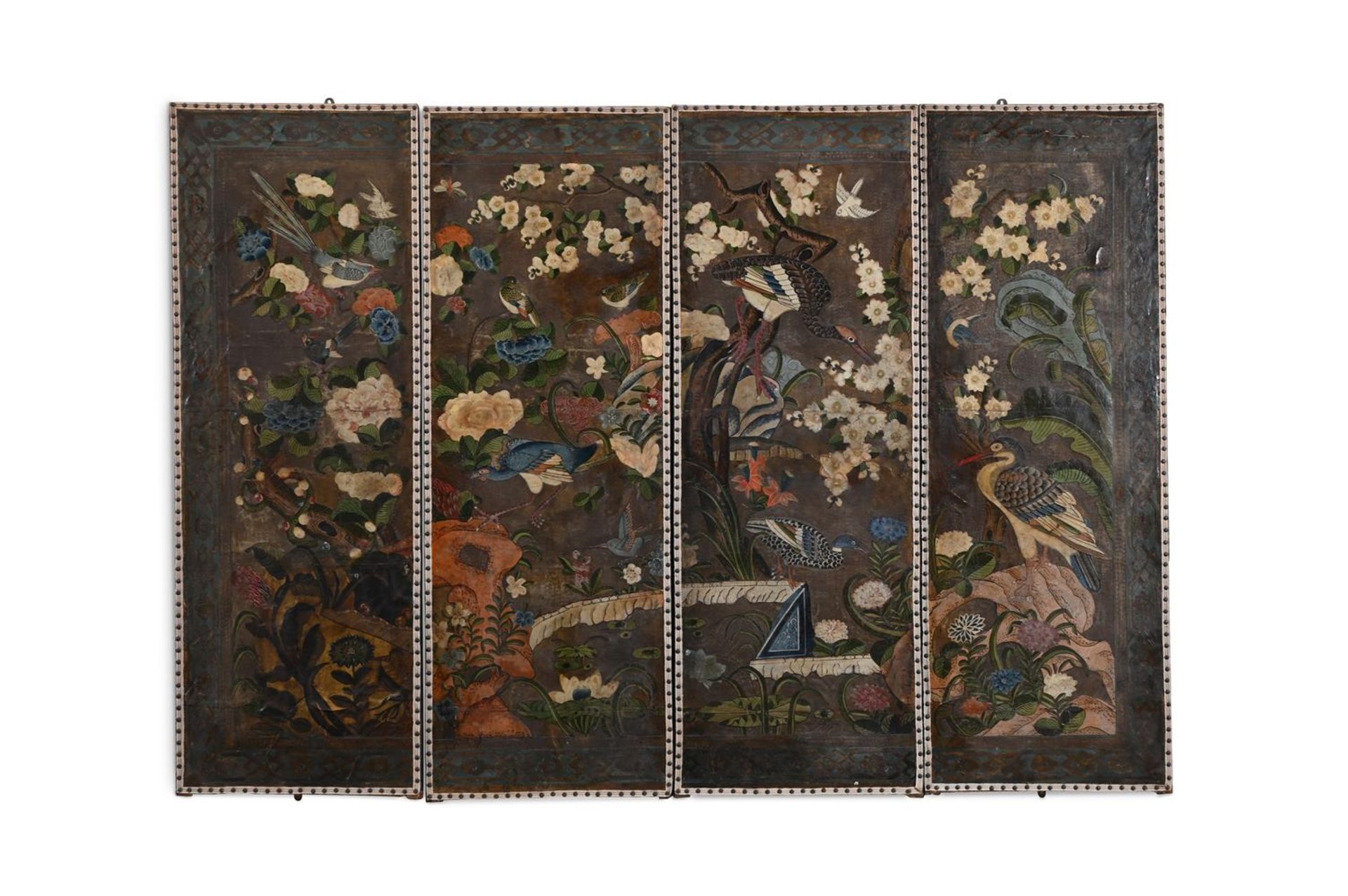 A LEATHER AND POLYCHROME PAINTED FOUR-FOLD SCREEN