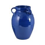 A LARGE BRANNAM BLUE-GLAZE RED POTTERY THREE-HANDLED VASE