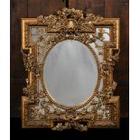 A GILT COMPOSITION MIRROR IN 19TH CENTURY STYLE, 20TH CENTURY