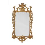 A GILTWOOD WALL MIRROR IN GEORGE III STYLE