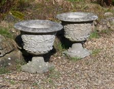 A PAIR OF STONE COMPOSITION URNS, 20TH CENTURY