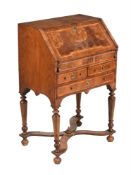 A GEORGE I WALNUT BUREAU, CIRCA 1720